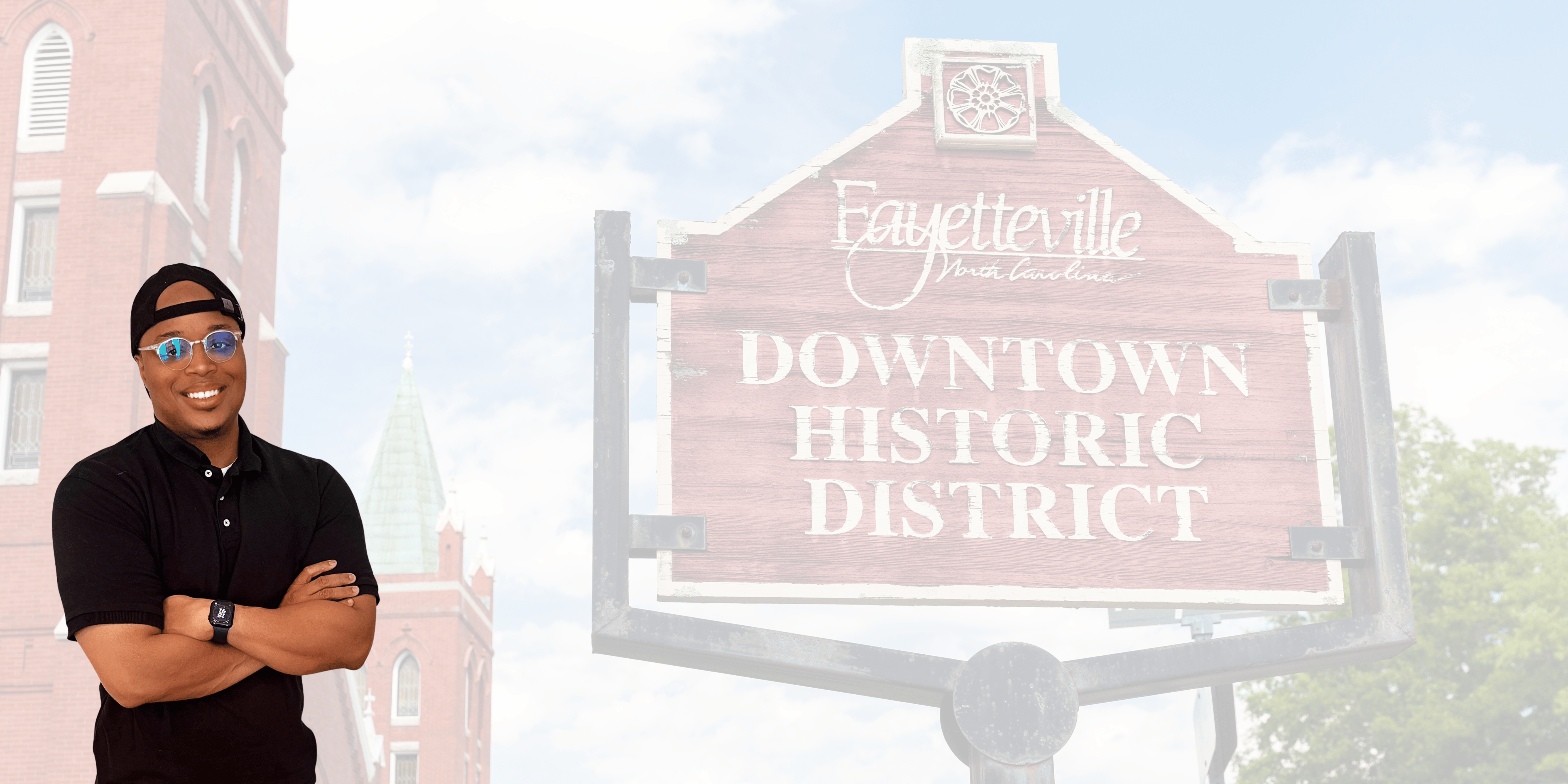 Downtown Historic District | Fayetteville, NC The Downtown Historic District sign in Fayetteville, North Carolina, surrounded by greenery, symbolizing the rich history and charm of the area.